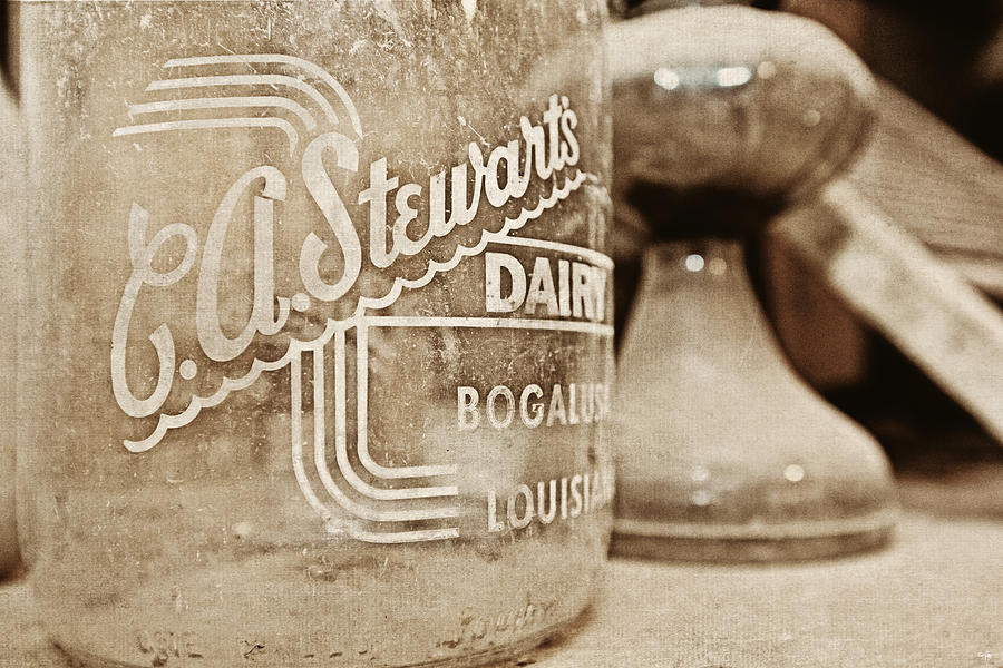 Vintage Photograph - C.A. Stewarts Dairy Milk Jug by Scott Pellegrin
