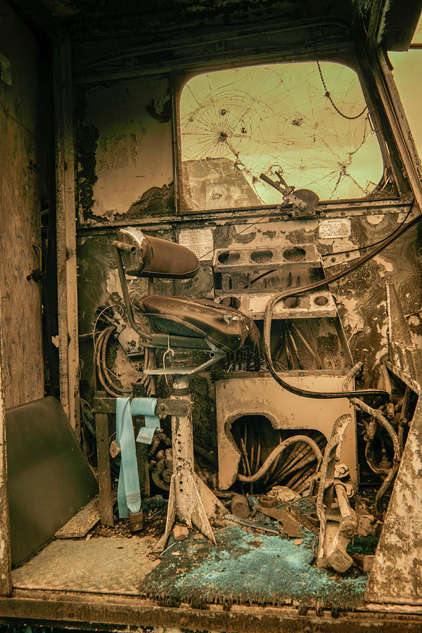 Cab of old heavy machinery in infrared Photograph by Karen Foley
