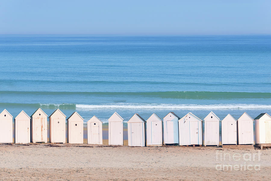 White vintage beach cabins facing the ocean Photograph by Delphimages ...