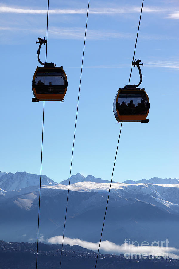 Cable Cars and Andes Mountains after Winter Snowfall Bolivia Photograph by James Brunker