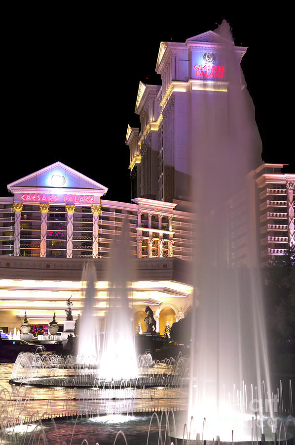 Caesars Fountains at Night Photograph by John Rizzuto