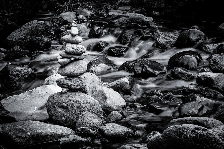 Cairn in a stream Photograph by The Flying Photographer