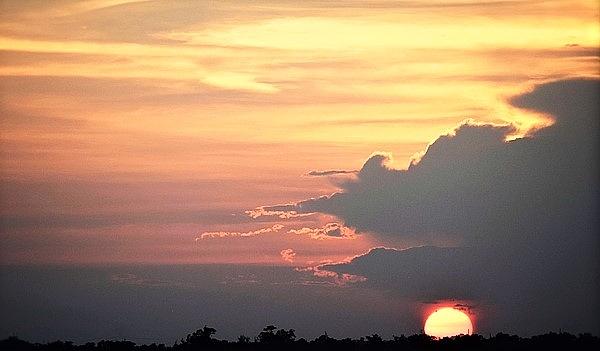 Cajun Summer Sunset Photograph by John Glass