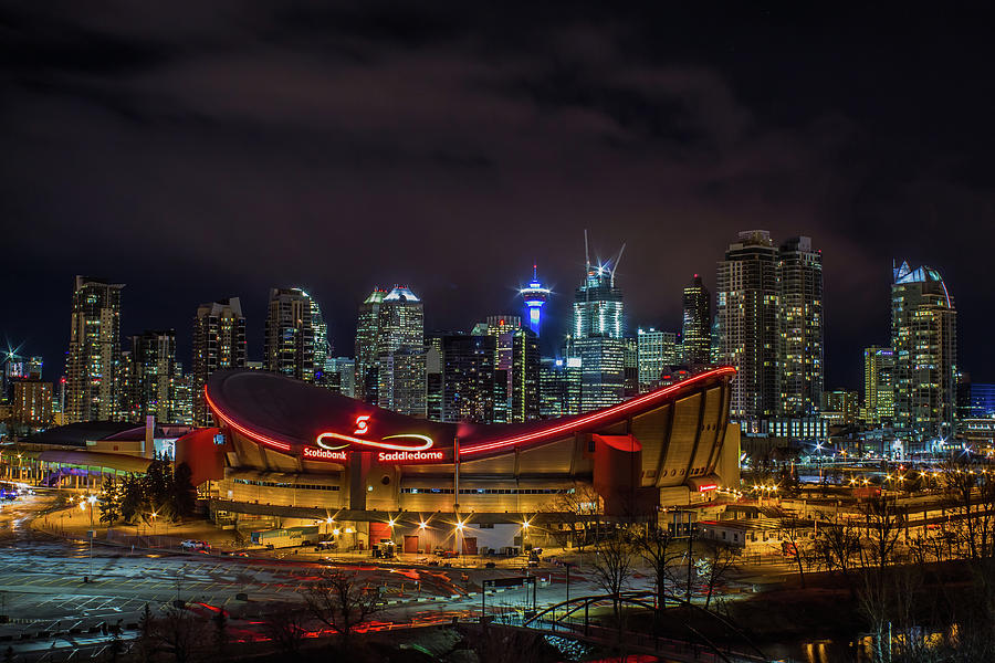 Calgary and the Saddledome at night Photograph by Jay Smith