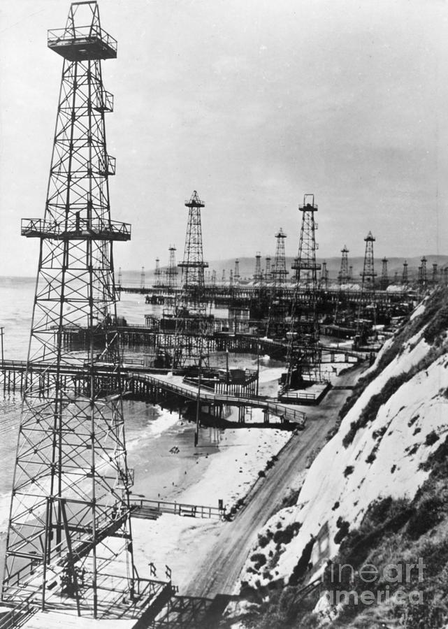 CALIFORNIA - OIL WELL DERRICKS, c1944 Photograph by Granger