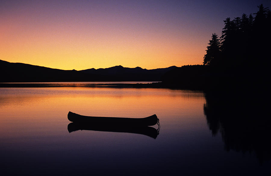 Sunset Photograph - Calming Canoe by John Hyde - Printscapes