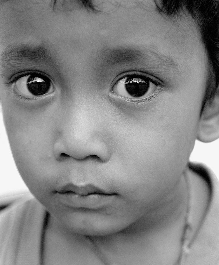 Black And White Photograph - Cambodian boy by David Wenman