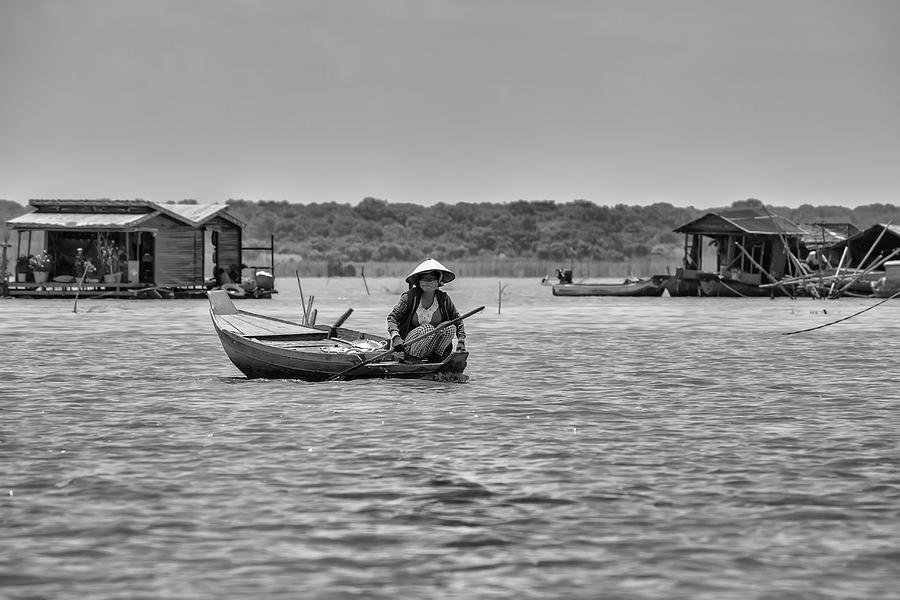 Cambodian Woman in a Boat Photograph by Georgia Clare