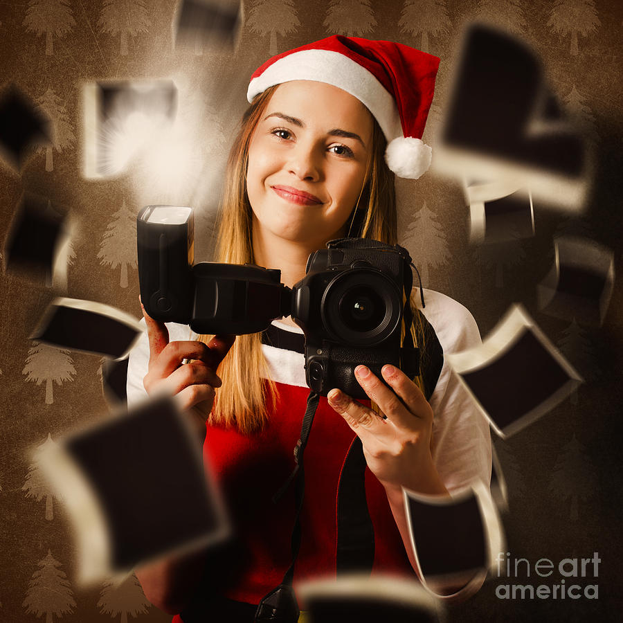 Camera holding santa helper taking christmas photo Photograph by Jorgo Photography