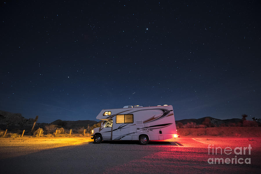Camper under a night sky Photograph by Juli Scalzi