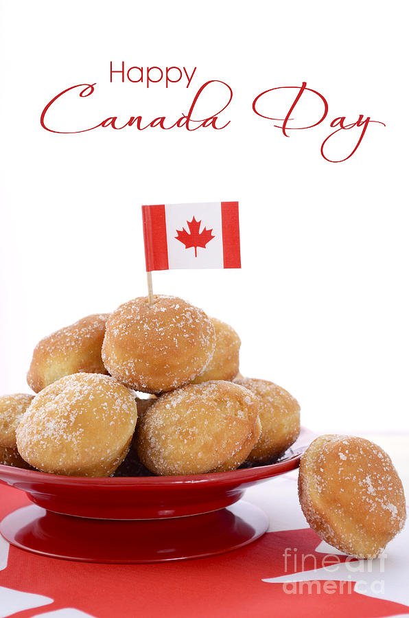Canada Day celebration with plate of donut holes. Photograph by Milleflore Images