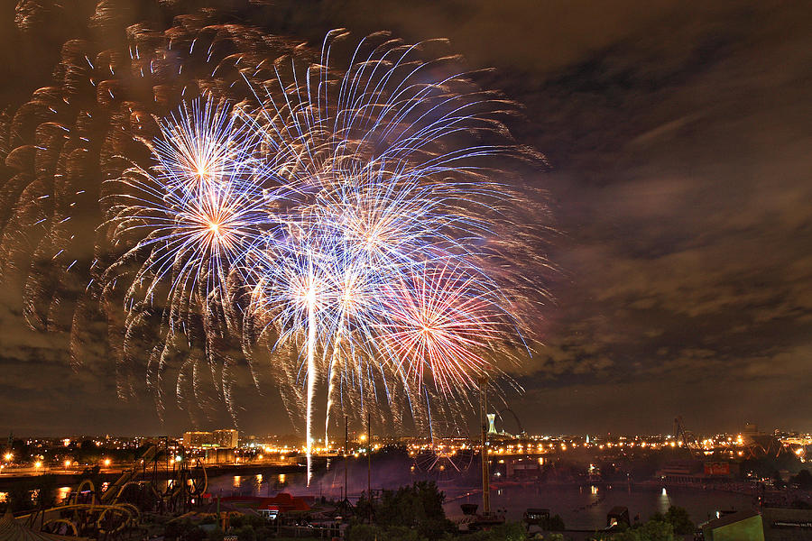 Canada day fireworks celebration in Montreal city Photograph by Pierre Leclerc Photography