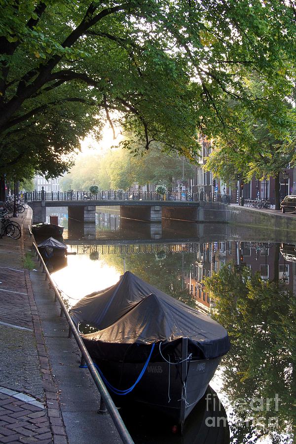Bridge Photograph - Canal and boat. Amsterdam. Netherlands. Europe by Bernard Jaubert