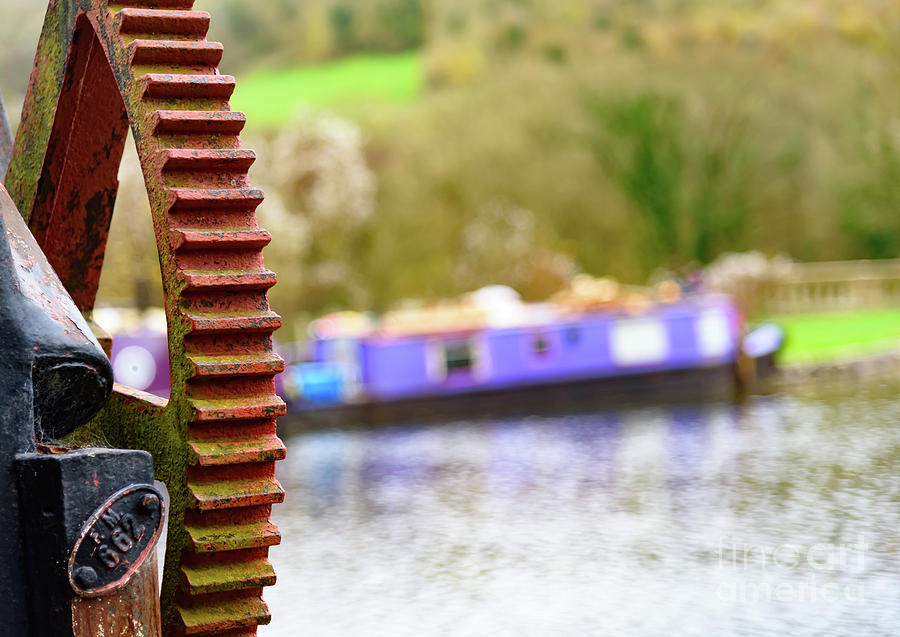 Canal boat and crane Photograph by Colin Rayner