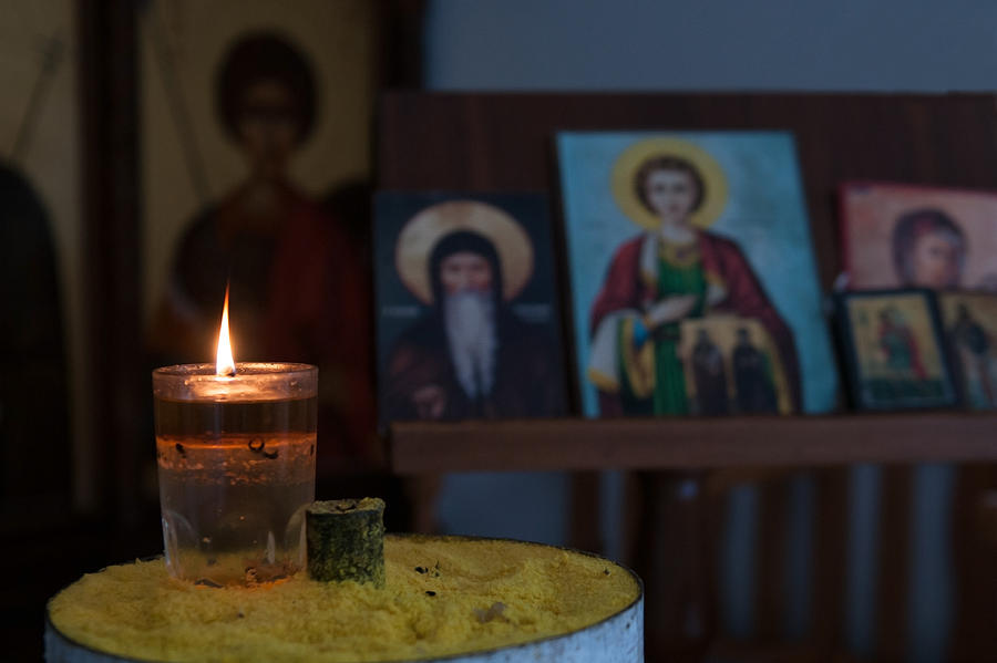 Candle light and Saints Photograph by Michalakis Ppalis