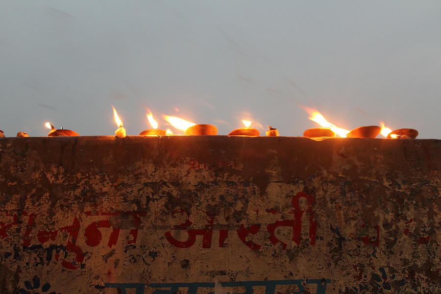 Candlelight on the Yamuna, Vrindavan Photograph by Jennifer Mazzucco