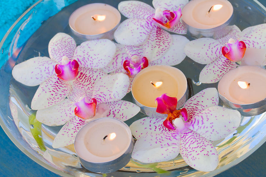 Candles and Orchids Photograph by Anastasy Yarmolovich