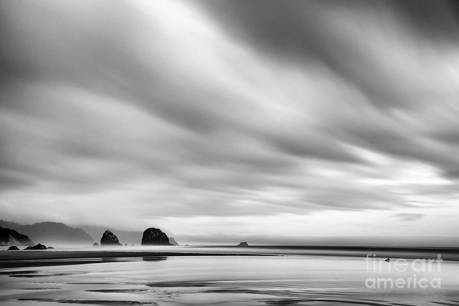 Cannon Beach long exposure sunrise in black and white Photograph by Paul Quinn