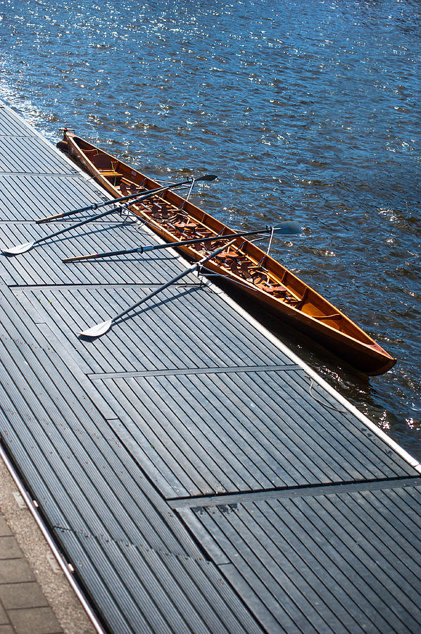 Canoe in Amsterdam Canal Photograph by Jenny Rainbow
