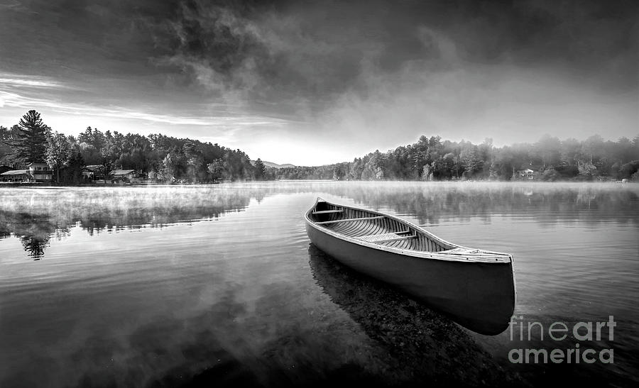 Canoe in the Mist, Flower Lake New York Black and White Photograph by Karen Jorstad