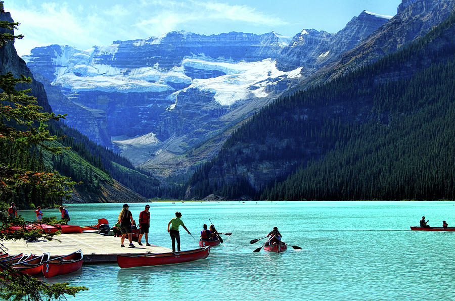 Canoe Season on Lake Louise Photograph by Ola Allen