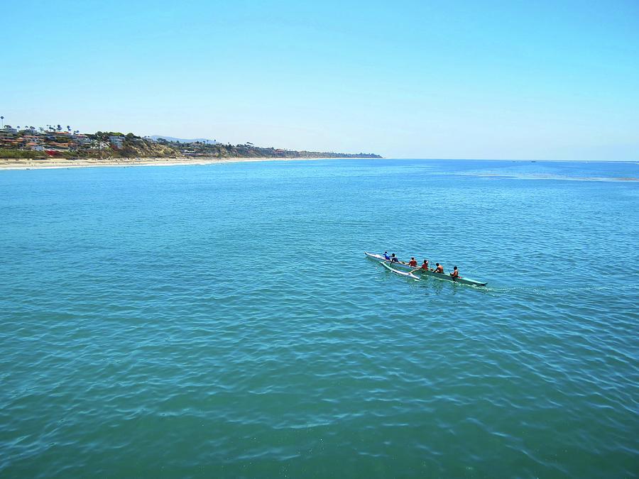 Canoeing on the Pacific Photograph by Connor Beekman