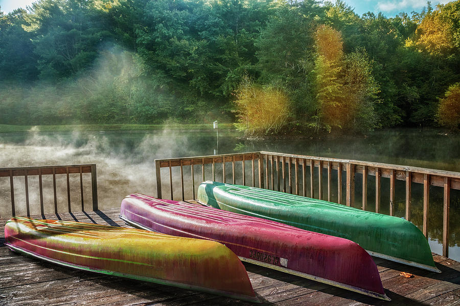 Canoes in the Sunshine Photograph by Debra and Dave Vanderlaan
