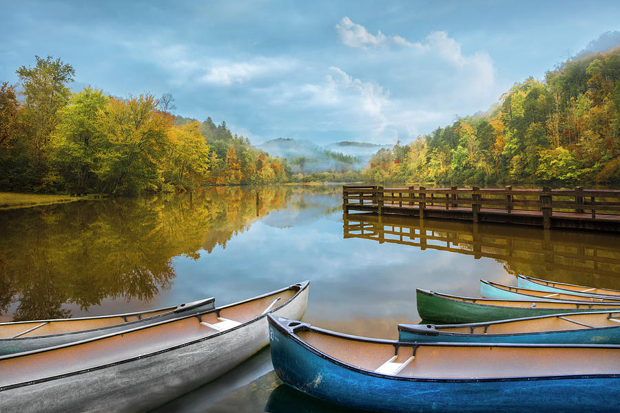 Canoes on a Misty Morning Photograph by Debra and Dave Vanderlaan