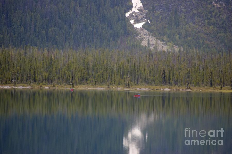 Canoes on Emerald Lake Photograph by David Birchall