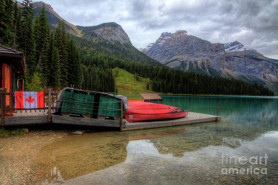 Canoes Stored Emerald Lake Yoho National Park British Columbia CA Photograph by Wayne Moran