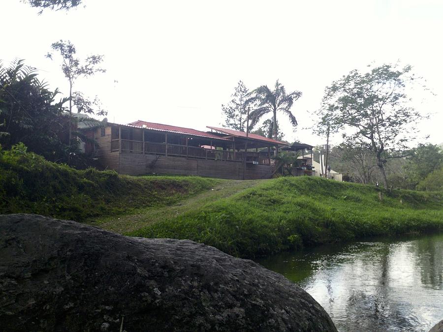 Cantine by the River Photograph by Walter Rivera-Santos