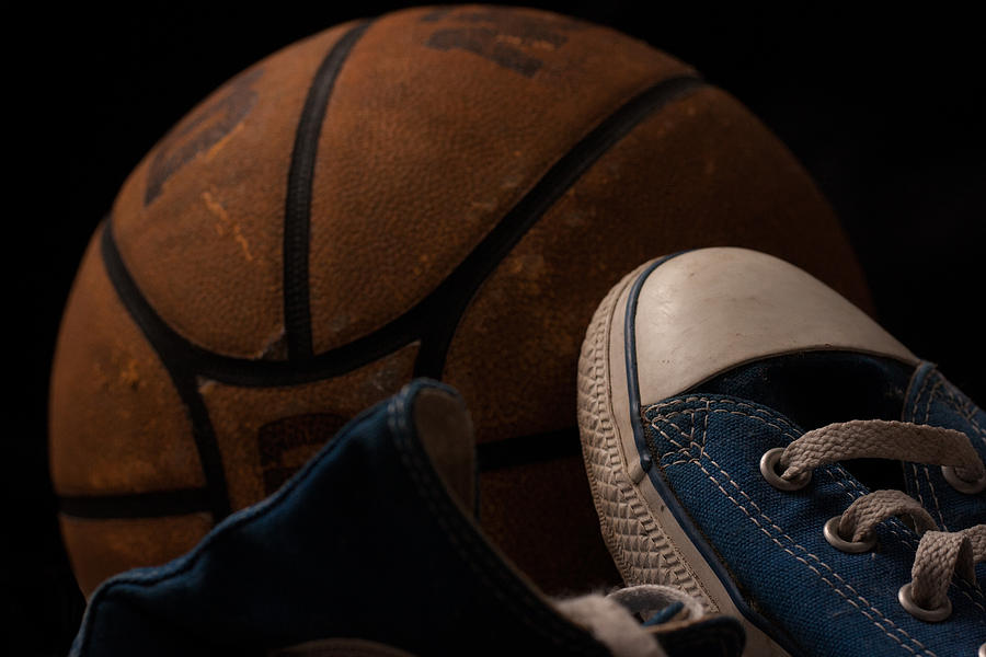 Canvas Shoes and Basketball Photograph by Eugene Campbell