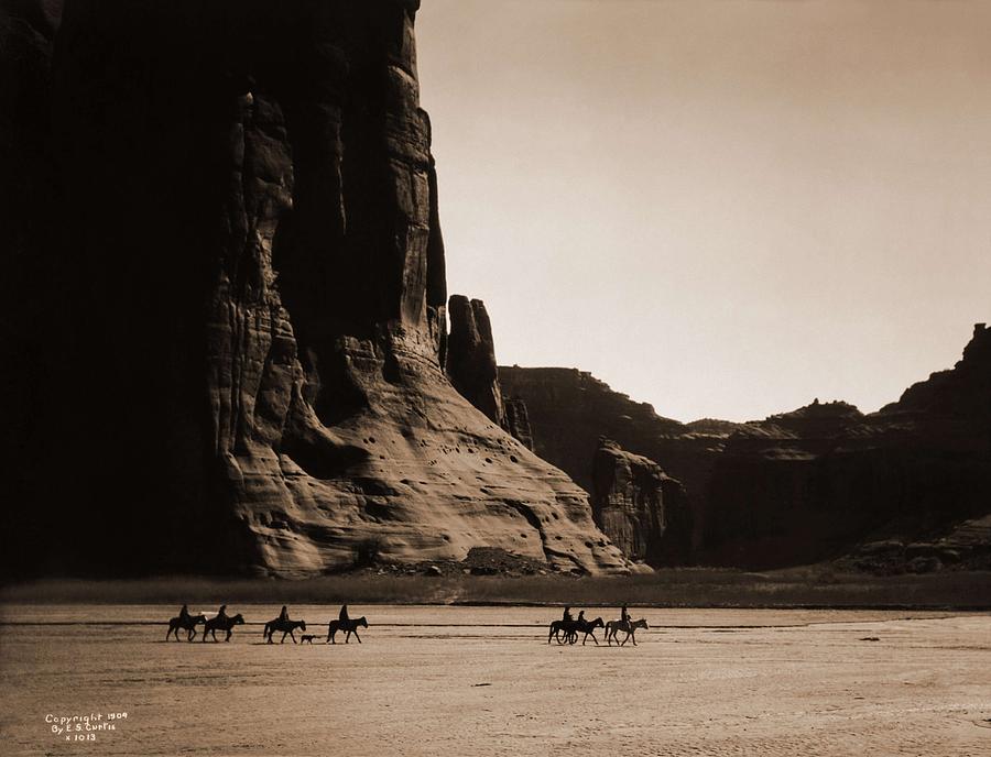Nature Painting - Canyon de Chelly  Navajo. Seven riders on horseback. Edward S. Curtis. USA, 1900 by Celestial Images