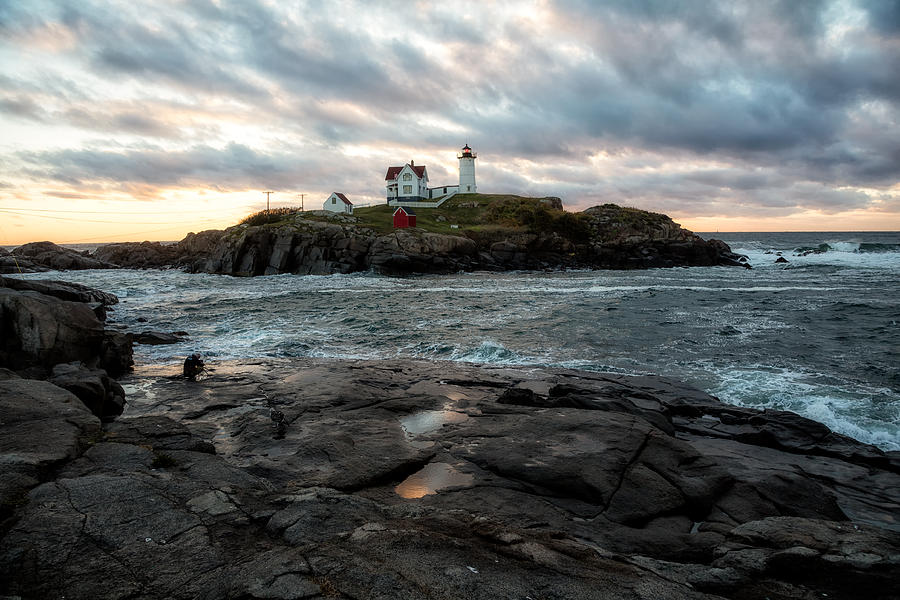 Catching the morning light at Nubble Lighthouse Photograph by John Hoey