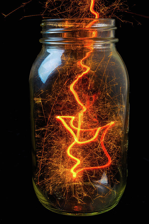 Captured Energy In A Jar Photograph by Garry Gay