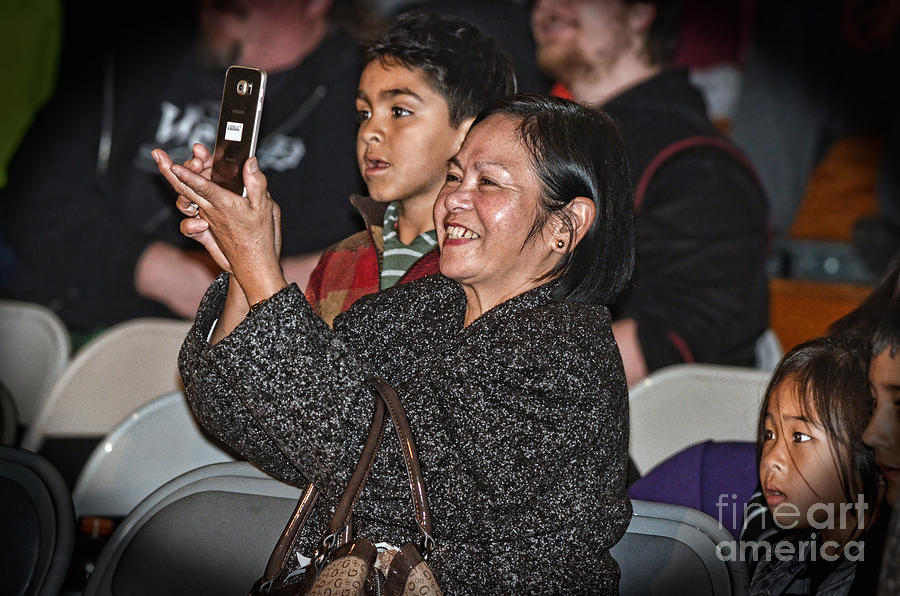 Capturing an enthusiastic Wrestling Fan Enjoying Herself and Capturing the Action with Her Phone  Photograph by Jim Fitzpatrick