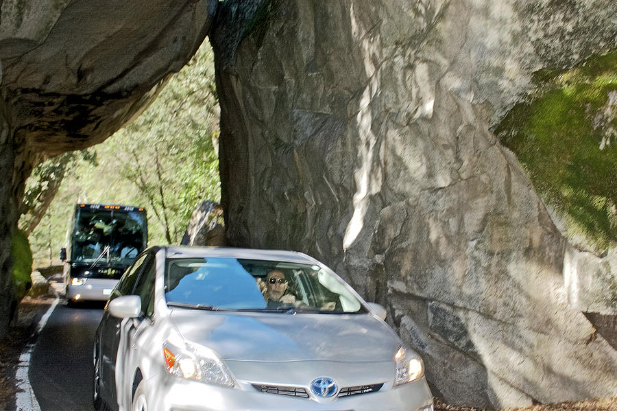 Car Coming into Yosemite Valley through 2 Rock Tunnel in Yosemite National Park, California Photograph by Ruth Hager