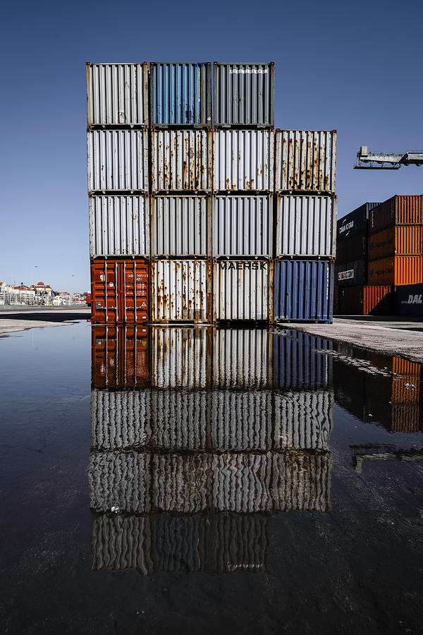 Crane Photograph - Cargo Containers Reflecting on Large Puddle III by Marco Oliveira