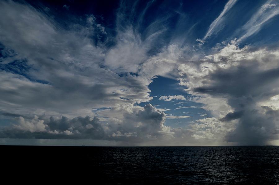Caribbean Sky Photograph by Chris Bavelles