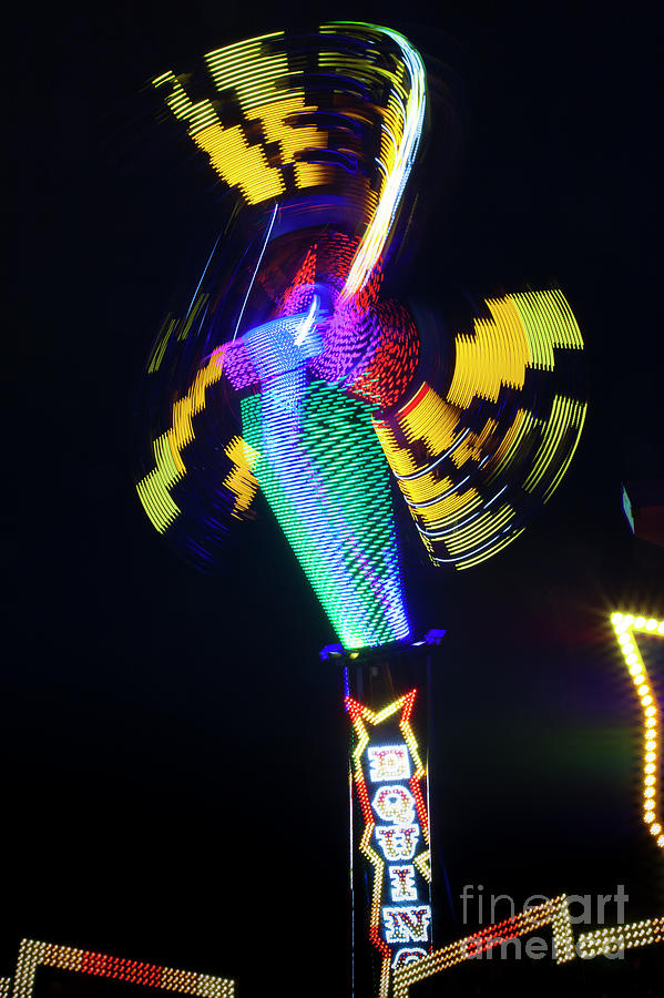 Carnival Ride in Motion, The Texas State Fair Photograph by Greg Kopriva