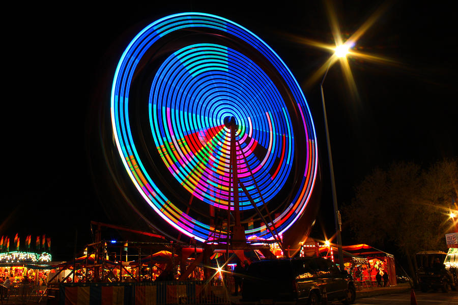 Carnival Wheel Of Fortune Photograph by Tommy McGuire