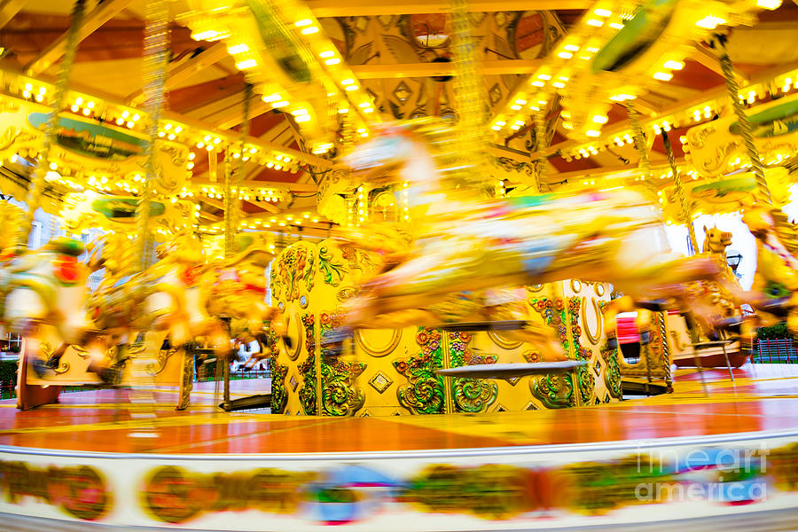 Carousel at speed Photograph by Colin Rayner