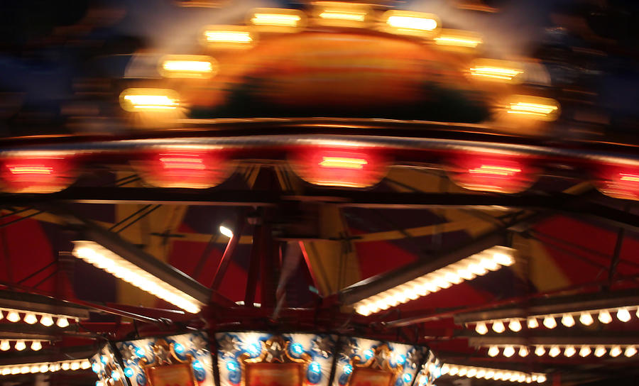 Carousel in Motion Photograph by Mary Bedy
