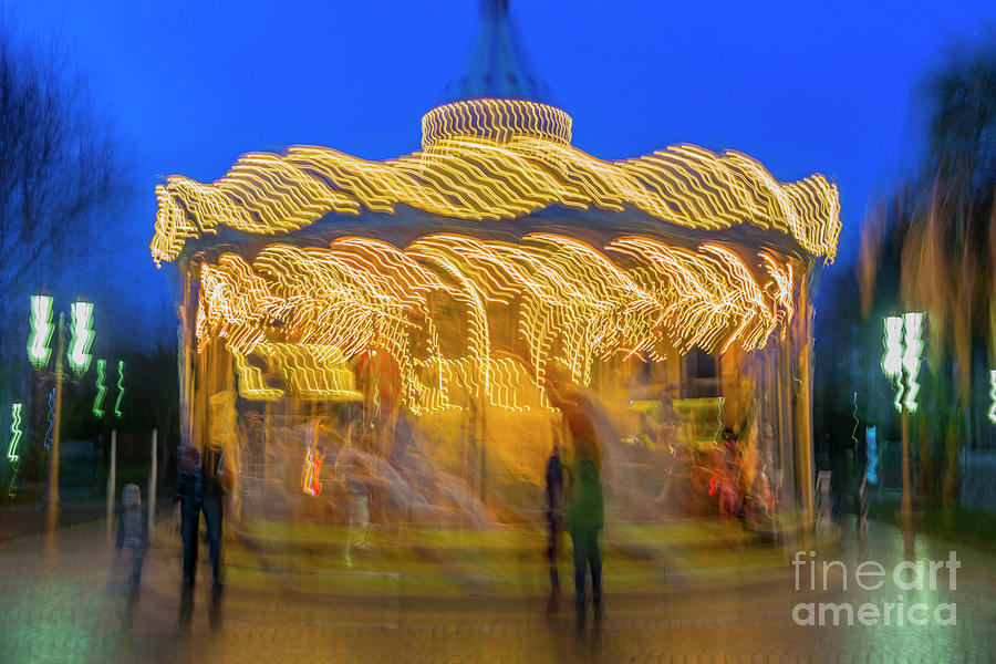 Carousel in Motion Photograph by Mats Silvan