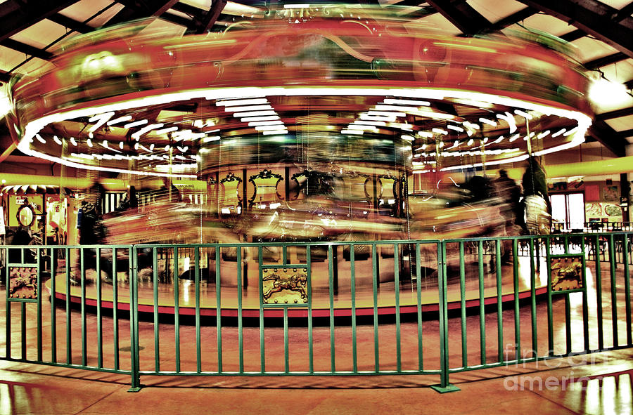 Carousel Motion  Photograph by Raymond Earley