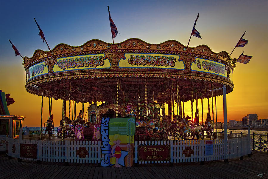 Carousel Sunset Photograph by Chris Lord