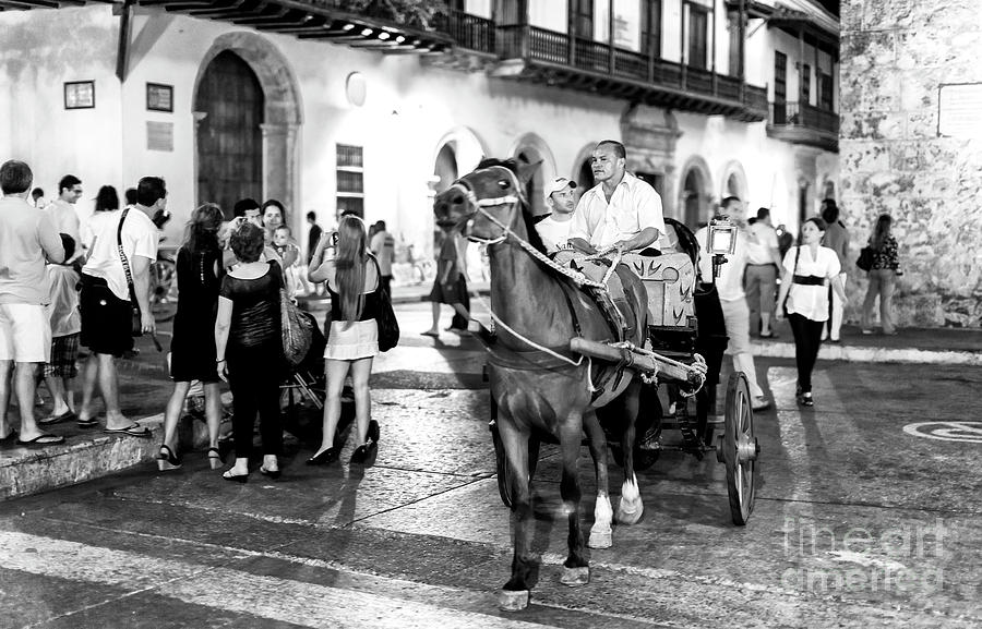 City Photograph - Carriage Ride Through Cartagena by John Rizzuto
