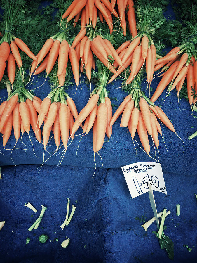Carrot Photograph - Carrots at the market by Tom Gowanlock