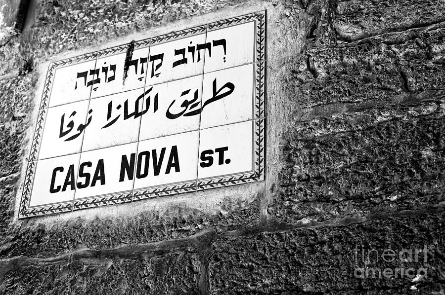 City Photograph - Casa Nova Street Sign in Jerusalem by John Rizzuto