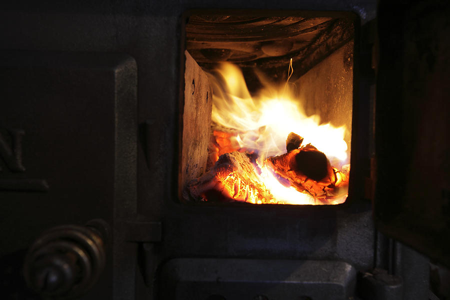 Cast iron wood stove Photograph by Ulrich Kunst And Bettina Scheidulin